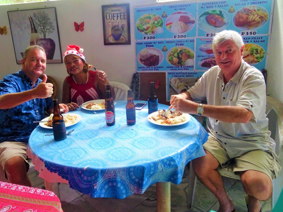 פוארטו גאלרה Happy Buddha Inn מראה חיצוני תמונה